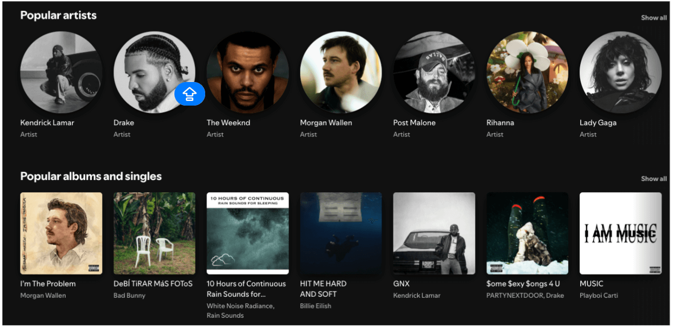 Spotify screen showing a grid of popular artists in one row and popular albums and singles in another. Each image and label is evenly spaced, creating a regular rhythm that gives equal visual weight to every element.